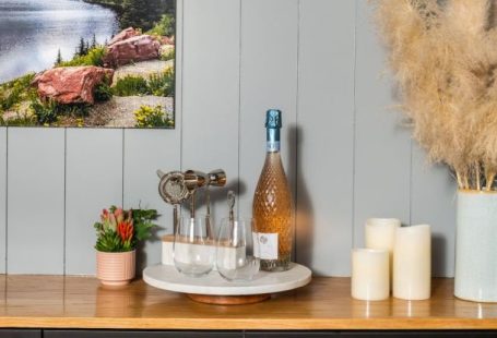 Image Optimization - A Rustic Wooden Countertop Adorned with Wine Essentials