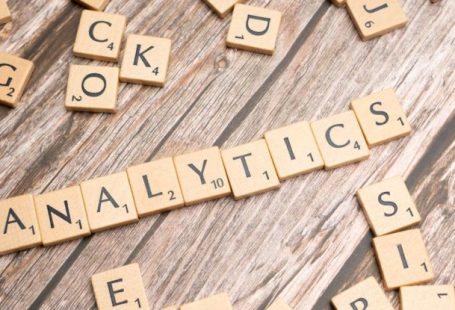 Predictive Analytics - The word analytics spelled out in scrabble tiles