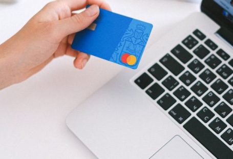 Personalization E-commerce - Person Holding Bank Card