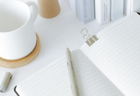 List Segmentation - Notebook opened on desk near books